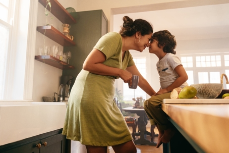 affectionate mother and son touching noses
