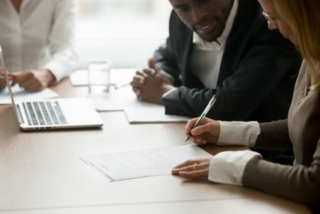 woman and man reviewing documents