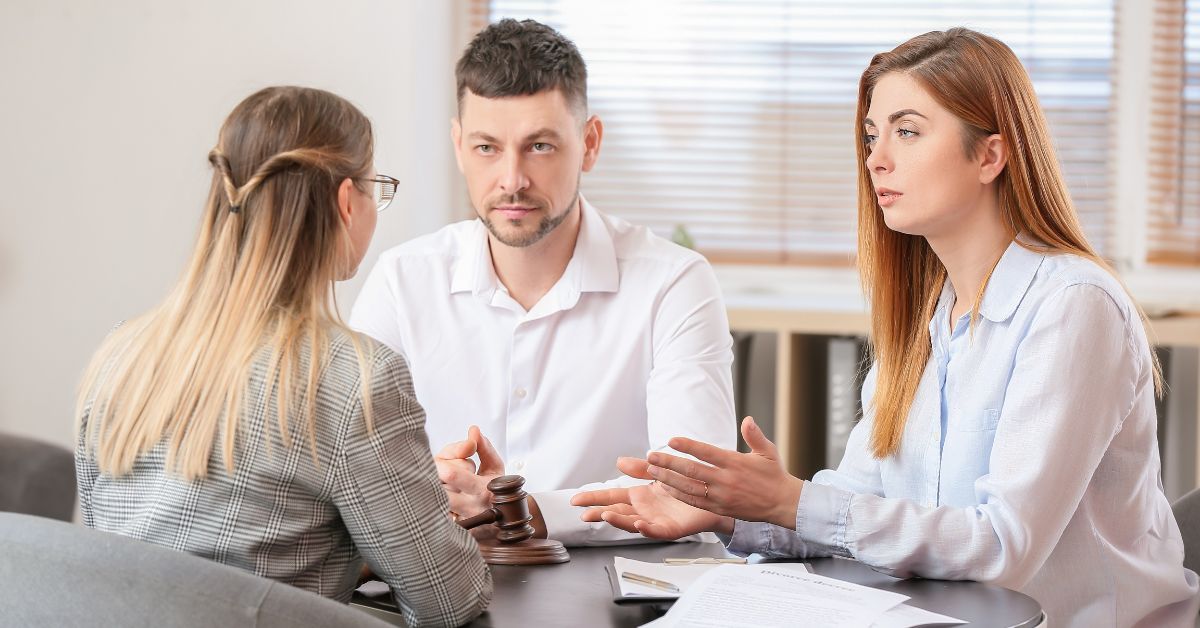 couple consulting divorce attorney